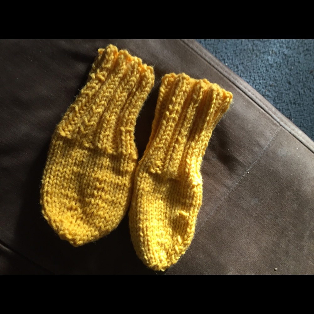 Hand knitted baby mittens